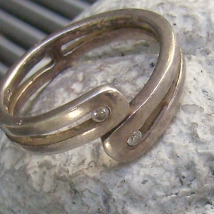 Vintage Sterling Silver By Pass Ring...Rhinestone Accents....Size 6 3/4...Signed