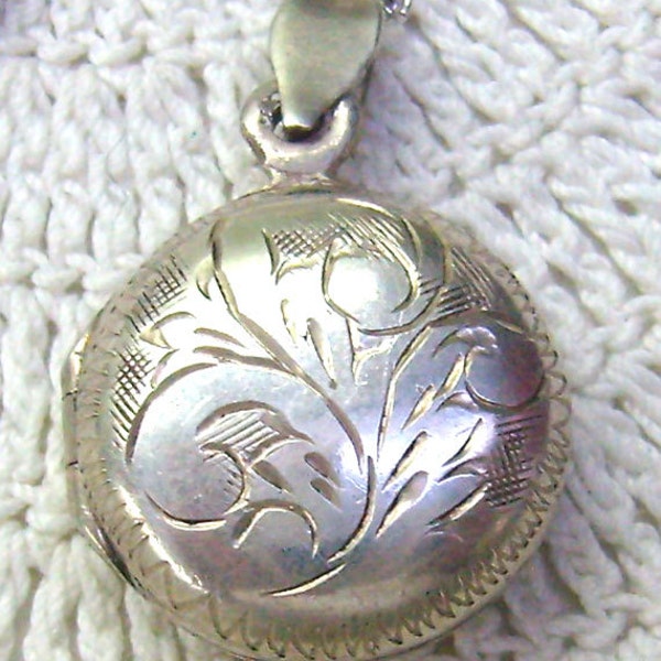 Reserved...Vintage Puffy Locket/Necklace...Sterling Round Locket...Embossed Floral Patterns Both Sides...Silver Chain....Photo Locket