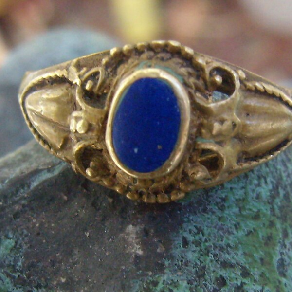 Art Deco/Vintage Brass Ring With Dark Blue Stone...Oval Blue Center...Ornate Brass Border...Size 7 1/4