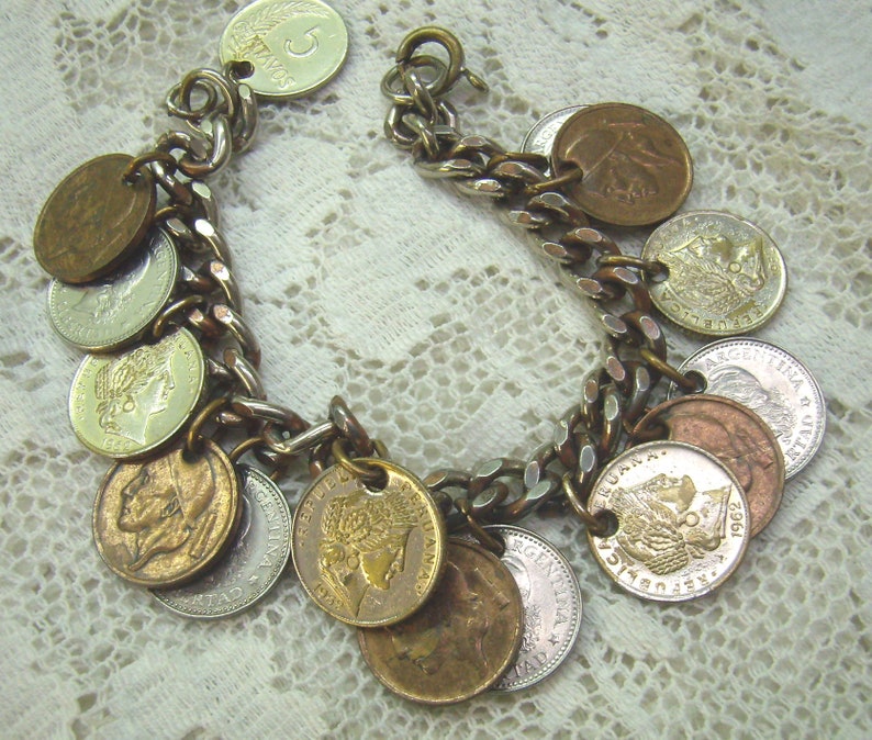 Summer Sale...Vintage Coin Bracelet....15 Coin Dangles...Argentina....Belgique...Peruana...Silver Metal Coin Charm Bracelet