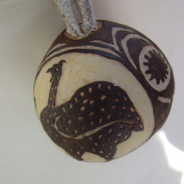 Vintage Tagua Nut Carved Pendant Necklace....Artisan...Emu....Unknown Animal (LOL)...Leather Cord..S.A. Nut