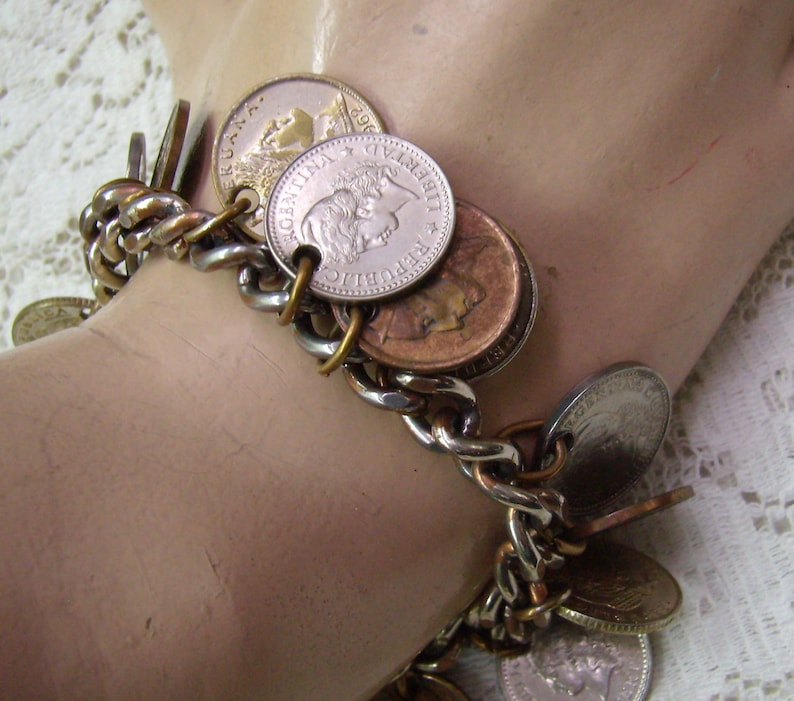 Summer Sale...Vintage Coin Bracelet....15 Coin Dangles...Argentina....Belgique...Peruana...Silver Metal Coin Charm Bracelet