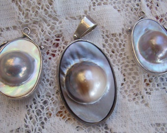 Antique/Vintage Hallmarked Blister Pearl Pendant...Sterling Blister Pearl Clip Back Earrings...Mother of Pearl Background