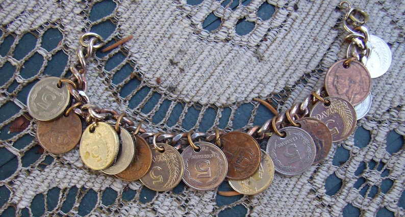 Summer Sale...Vintage Coin Bracelet....15 Coin Dangles...Argentina....Belgique...Peruana...Silver Metal Coin Charm Bracelet