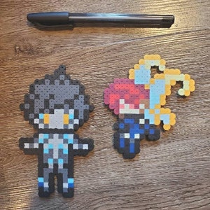 May include: Two pixel art figures made with colourful beads. The figure on the left is a blue and grey character with yellow eyes. The figure on the right is a red, blue and yellow character with a yellow halo.