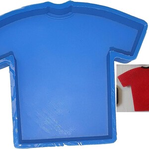 May include: Blue silicone mold shaped like a t-shirt. The mold is designed to create a t-shirt-shaped cake or other edible item.