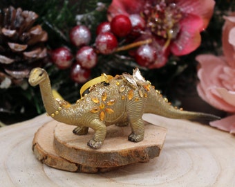 Golden diplodocus ornament