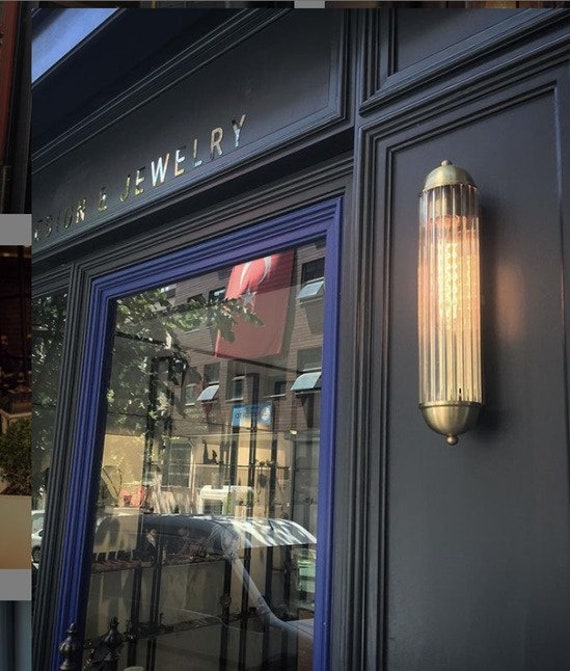 Glass tube wall sconce deals