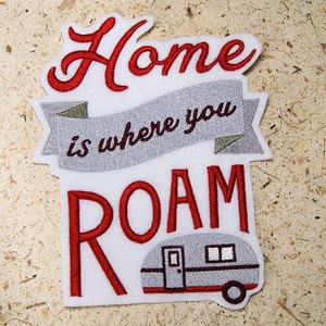 May include: Red embroidered patch with the text "Home is where you roam" and a small gray camper van illustration.