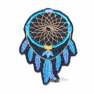May include: Embroidered dreamcatcher patch with a black background, a turquoise ring, and gold and turquoise details. The patch features blue feathers hanging below the ring. The text "MTcoffinz" is visible at the bottom.