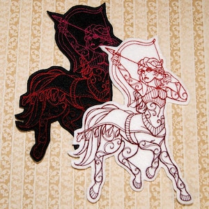May include: Two embroidered patches depicting a centaur archer. One patch is black with red embroidery, the other is white with red embroidery.