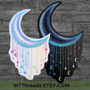 May include: Two embroidered crescent moon patches. One is white with blue and rainbow accents, the other is black with blue and yellow accents. Both have dangling star and moon details. Text at the bottom reads MTThreadz.Etsy.com.