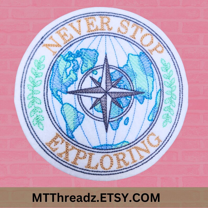 May include: Embroidered patch with a compass and a world map in the center. The text "NEVER STOP EXPLORING" is around the outside of the patch.
