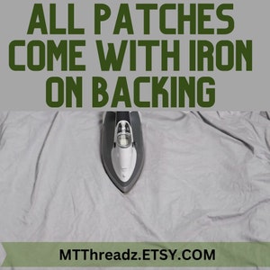 May include: A white iron with a gray handle is on a white fabric surface. The text "ALL PATCHES COME WITH IRON ON BACKING" is at the top of the image and the text "MTTThreadz.ETSY.COM" is at the bottom of the image.