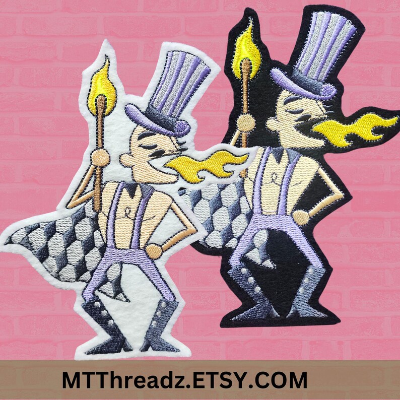 May include: Two embroidered iron-on patches featuring a cartoon character with a top hat, a checkered cape, and a flame coming out of their mouth. The character is holding a torch in one hand. One patch is white and the other is black.