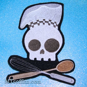 May include: Embroidered iron-on patch featuring a white skull wearing a white chef's hat with black and white checkered trim. The skull is holding a black and white whisk and a brown wooden spoon.