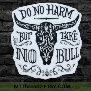 May include: A white, embroidered patch featuring the text "DO NO HARM BUT TAKE NO BULL" around a black bull skull design. The patch has a decorative border and the Etsy shop URL is visible at the bottom.