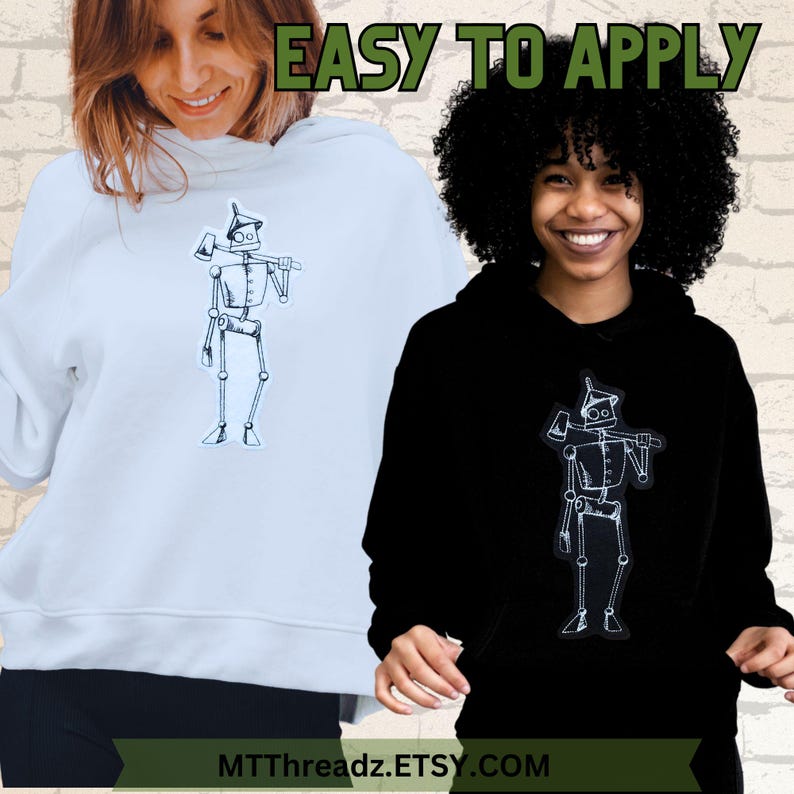 May include: Two people wearing hooded sweatshirts with a white outline of the Tin Man from The Wizard of Oz on the front. The text "EASY TO APPLY" is at the top of the image. The text "MTTThreadz.ETSY.COM" is at the bottom of the image.