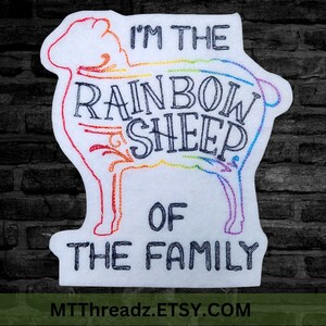 May include: Embroidered patch with a rainbow sheep silhouette and the text "I'm the rainbow sheep of the family".