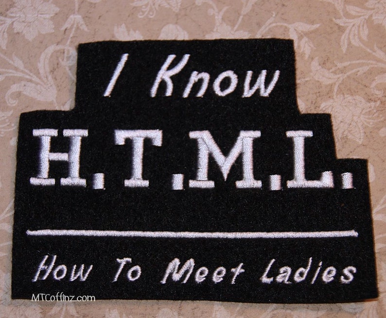 May include: Black felt patch with white embroidery that reads "I Know H.T.M.L. How To Meet Ladies" and the website "MTCoffinz.com".