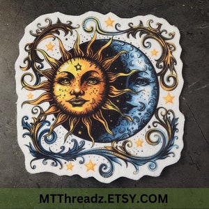 May include: A white background with a yellow sun and a blue moon with a face. The sun and moon are surrounded by a swirling, floral design with stars.