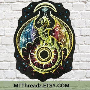 May include: Embroidered patch featuring a dragon with rainbow wings, a yellow body, and a sun-like design at the bottom. The patch is black with a scalloped edge and the text MTThreadz.Etsy.com at the bottom.