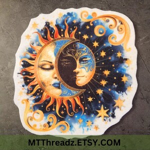 May include: A colorful illustration of a sun and moon with a starry background. The sun has a human face with closed eyes and the moon has a human face with one eye open and a mask. The image is surrounded by swirling vines and stars.