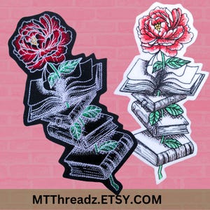 May include: Two embroidered iron-on patches featuring a red flower growing from a stack of books. The flower is a peony with green leaves. The books are black and white with a white background. The text "MTTThreadz.ETSY.COM" is at the bottom of the image.