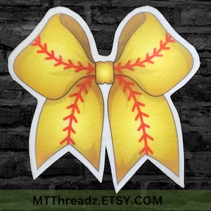 May include: A yellow softball bow with red stitching details, resembling a softball. The bow has a white outline and a brown centre. The text "MTThreadz.ETSY.COM" is at the bottom.
