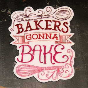 May include: White felt patch with red embroidery that reads "Bakers Gonna Bake". The design includes a spoon and whisk.