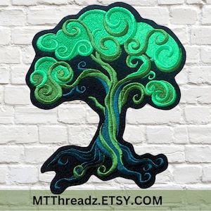 May include: Embroidered patch featuring a stylized tree with swirling green leaves and branches against a black background. The tree's trunk and roots are detailed with blue and green threads. The text "MTThreadz.ETSY.COM" is at the bottom.