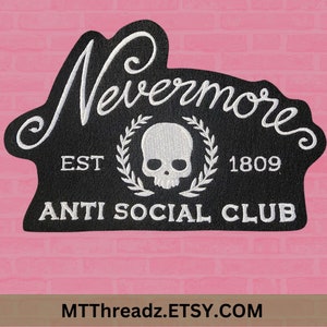 May include: Black embroidered patch with the word "Nevermore" in white script. The patch features a skull within a laurel wreath, the text "EST 1809" and "ANTI SOCIAL CLUB". The patch is on a pink brick background.
