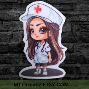 May include: A cartoon illustration of a nurse wearing a white uniform, a white cap with a red cross, and a stethoscope. The nurse has long brown hair and is standing on a white background.