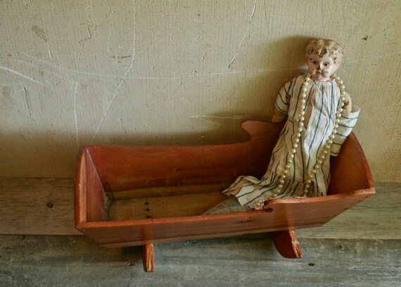 primitive antique wooden baby cradle