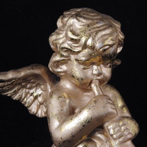 Vintage playing Cherub/angel  figurine