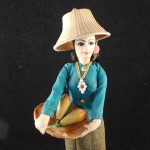 Vintage doll in the hat