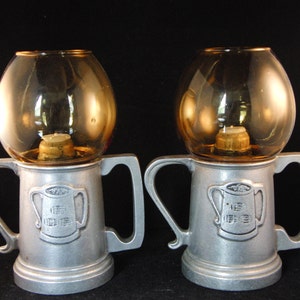 Vintage metal and yellow glass candle holders (2 candle holders).