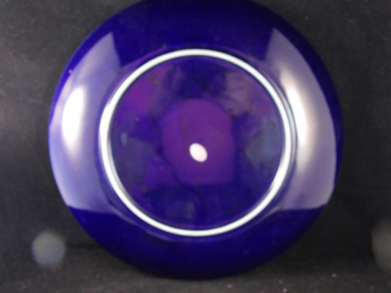 Vintage blue plate with peacock