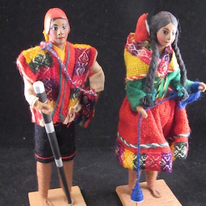 Vintage doll boy and girl in national costume