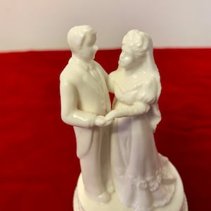 Vintage wedding cake topper bride and groom