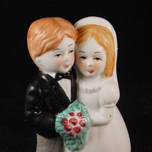 Vintage wedding cake topper bride and groom