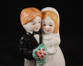 Vintage wedding cake topper bride and groom