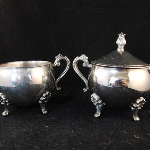 Silver plated sugar and milk serving set by International silver company
