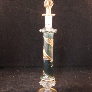 Vintage green glass perfume bottle