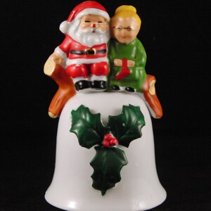 Porcelain bell Santa Claus and Mrs. Claus