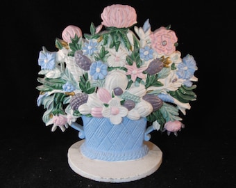Vintage solid cast iron flowers in the basket door stopper