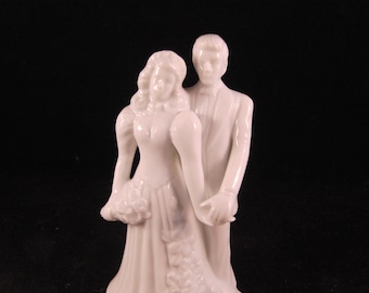 Vintage wedding cake topper bride and groom