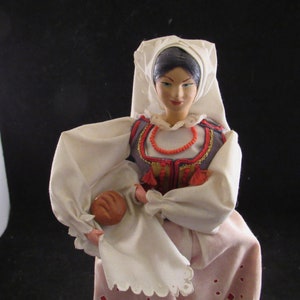 Vintage doll in national costume Polish/Russian