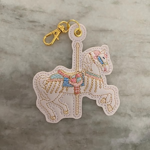 Carousel horse Jingles key fob, bag charm, sleeping beauty castle, keychain, magical keychain, King Arthur’s carousel