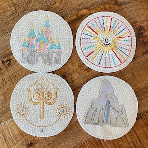 Magical coasters, sleeping Beauty castle, faux leather coasters, Matterhorn, fun wheel, small world, attraction coasters